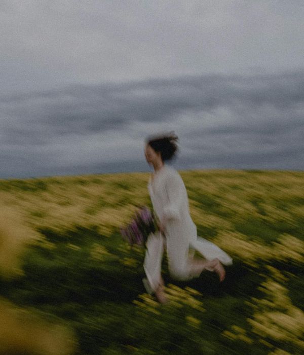 Woman feeling energetic and serene outdoors.